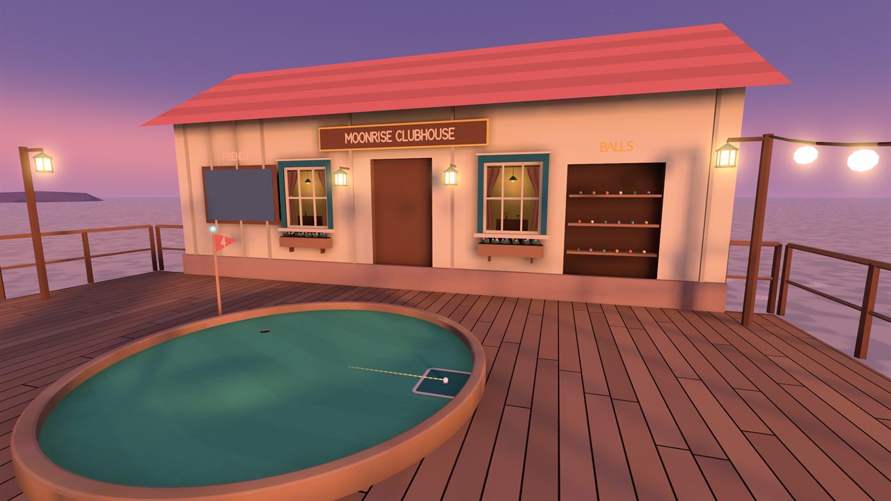 The Moonrise Clubhouse and its round practice green on a wooden terrace at dusk
